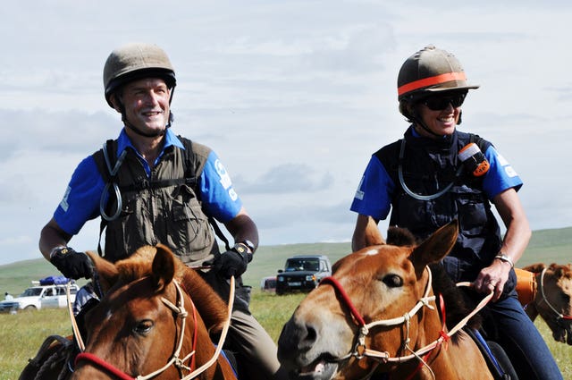Former Cabinet minister Owen Paterson with wife Rose after completing a 1,000 km horse ride across Mongolia for Charity
