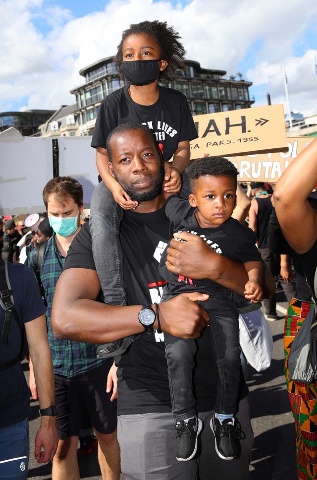 People march in central London after attending a Black Lives Matter rally in Hyde Park