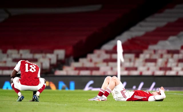 Arsenal players react to being knocked out