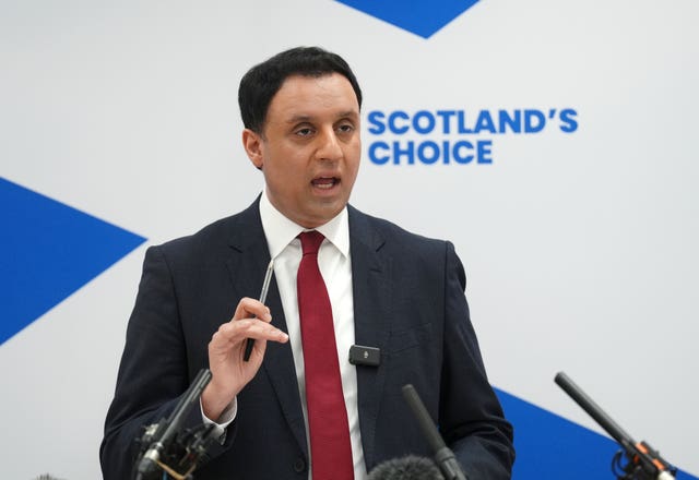 Anas Sarwar speaking from a lectern
