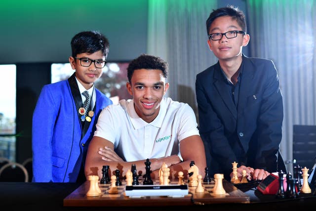 Alexander Arnold with his advisers Shreyas Royal (left) and Kyan Bui