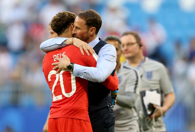 England manager Gareth Southgate (right) congratulates goalscorer Dele Alli (Tim Goode/PA)