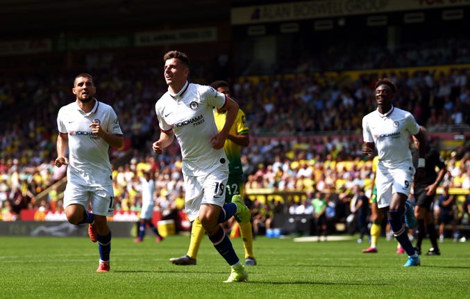 Mason Mount, centre, celebrates his goal at Carrow Road