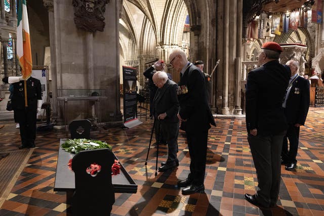 Irish President Michael D Higgins lays a wreath at St Patrick’s Cathedral in Dublin