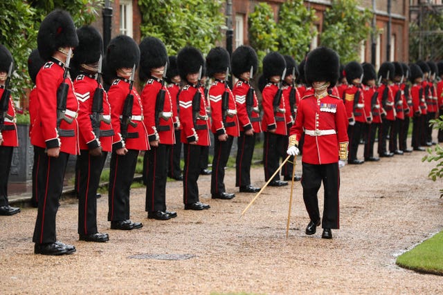 A Guard of Honour of the Coldstream Guards for French president Emmanuel Macron upon his arrival at Clarence House in London