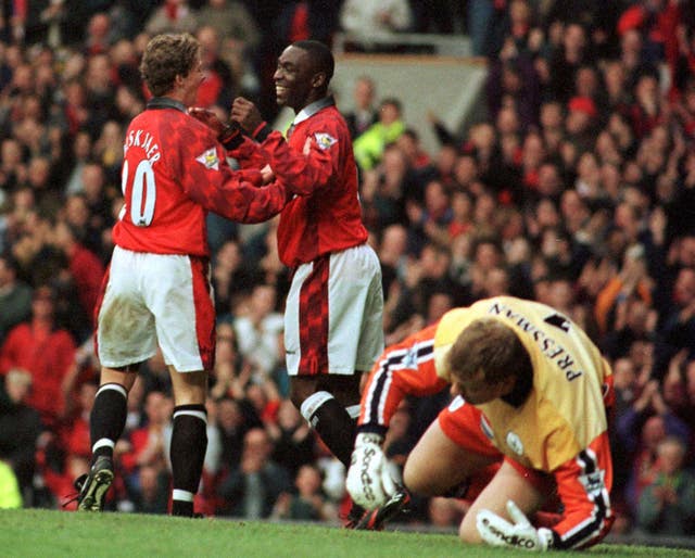 Andy Cole and Ole Gunnar Solskjaer celebrate scoring at Old Trafford