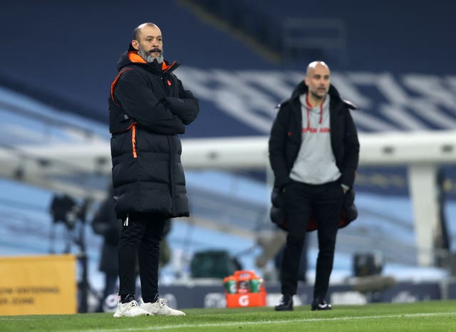 Pep Guardiola (right) feels City could learn much from their game against Wolves