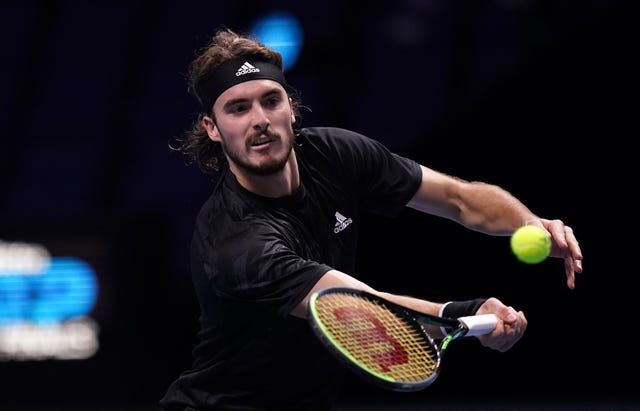 Stefanos Tsitsipas plays a volley during his defeat by Rafael Nadal