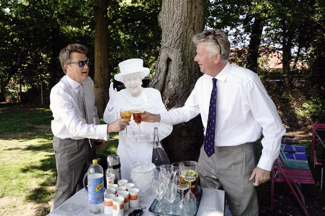 The Queen missed out again - or did she? These two chaps found a substitute before racing