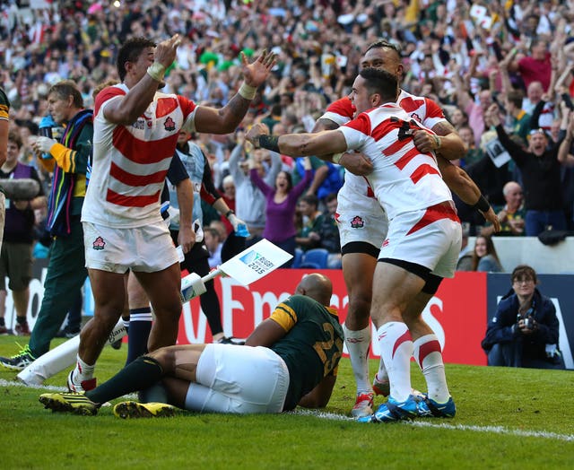 Japan’s Karne Hesketh (right) celebrates (Gareth Fuller/PA)