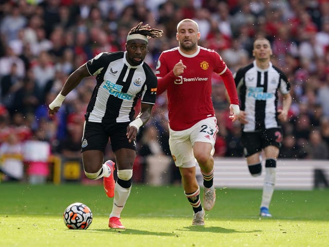 Luke Shaw, right, has started in all four of Manchester United's Premier League games this season