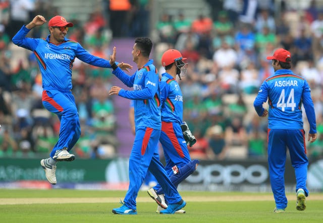 Mujeeb Ur Rahman, centre, impressed for Afghanistan (Adam Davy/PA)