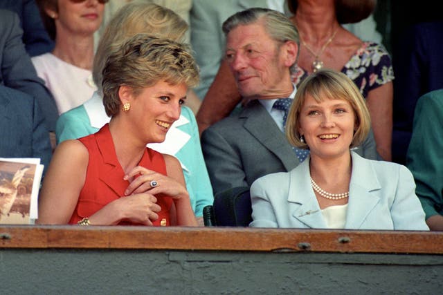 Diana, pictured at Wimbledon with good friend Julia Samuel, remains an icon for many. Neil Munns/PA Wire