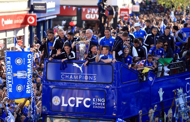 Leicester's Premier League winning team on the bus during a parade (PA)