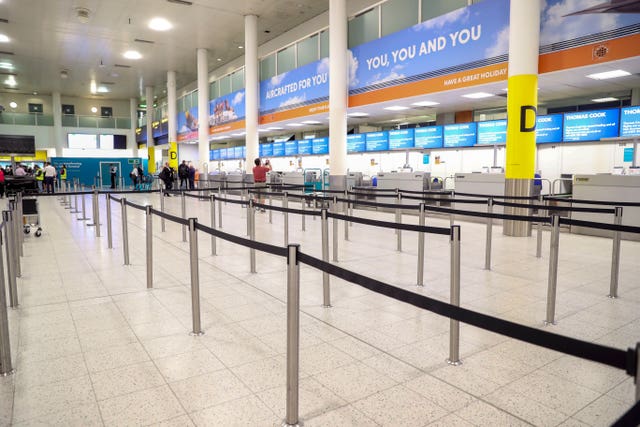 Thomas Cook check-in desks were left empty on Monday (Steve Parsons/PA)