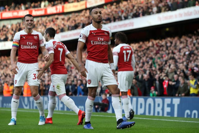 Aubameyang (centre) opened the scoring with a 10th-minute penalty (Nick Potts/PA).