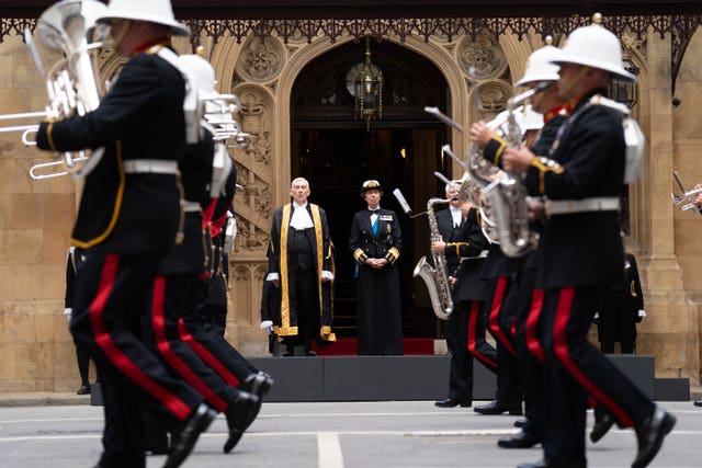 The Princess Royal and Commons Speaker Sir Lindsay Hoyle watch the Beating Retreat ceremony by the band of the Royal Marines