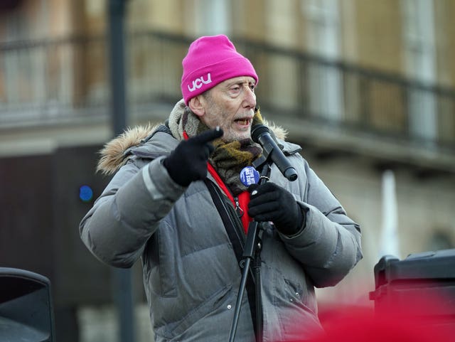 Poet Michael Rosen speaks during a protest outside Downing Street