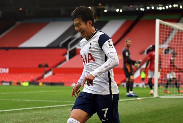 Son Heung-min celebrates scoring Tottenham's fourth goal in their 6-1 win at Old Trafford