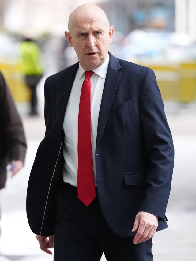 John Healey walking outside