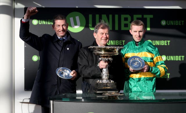 Trainer Gavin Cromwell (left), owner JPMcManus and jockey Mark Walsh after Espoir D’Allen's Champion Hurdle win