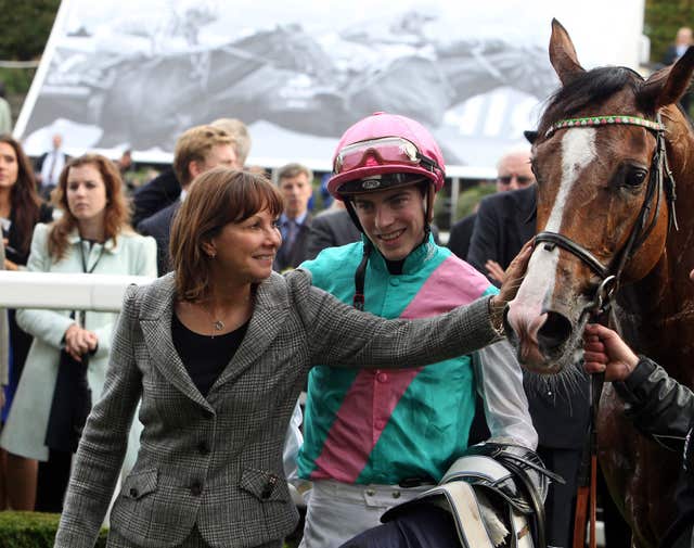 Lady Cecil congratulates Noble Mission and James Doyle following the Champion Stakes