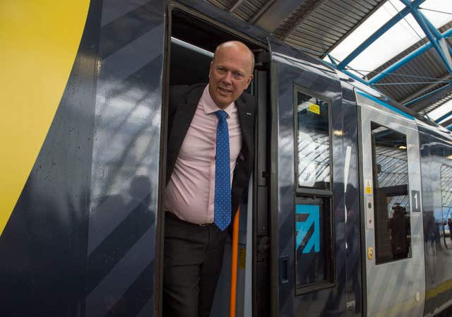 Chris Grayling commended the efforts of rail workers (Victoria Jones/PA)