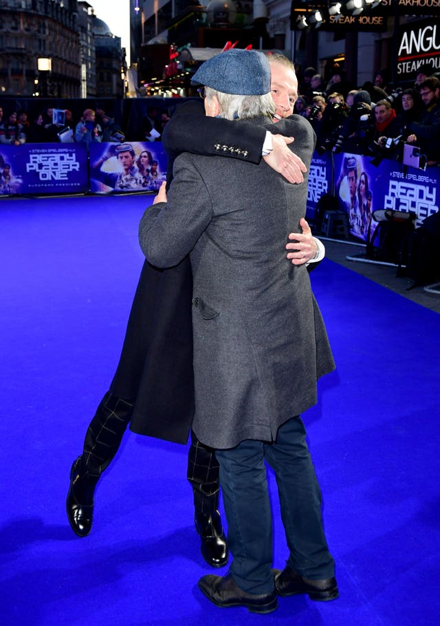 Pegg and Spielberg share an opportune hug