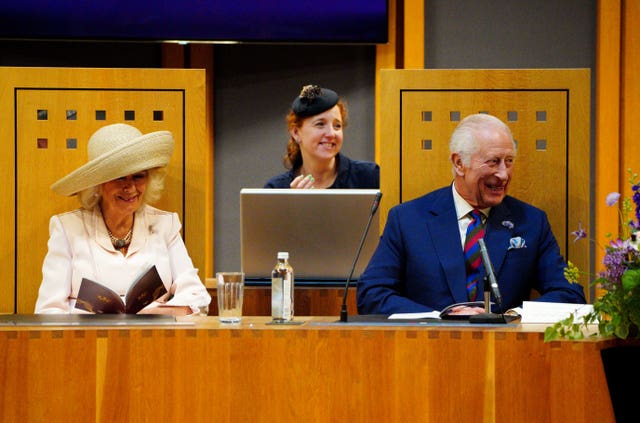 The King and Queen as they sit in the Senedd