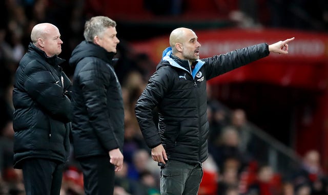Pep Guardiola (right) got his tactics spot on against Manchester United