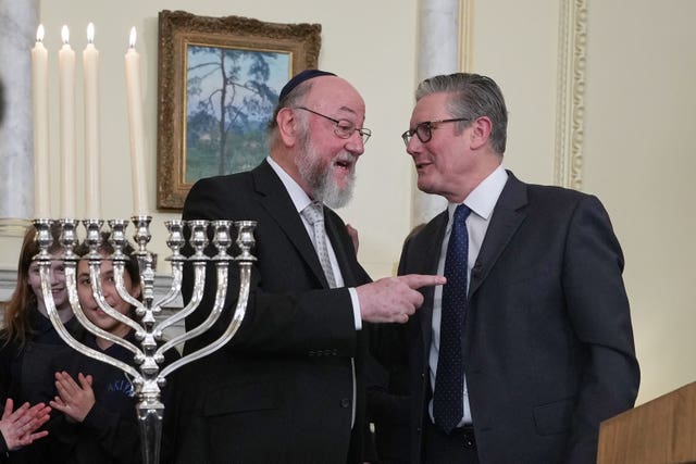Prime Minister Sir Keir Starmer and chief rabbi Sir Ephraim Mirvis during a reception at Downing Street, London, to celebrate Hanukkah