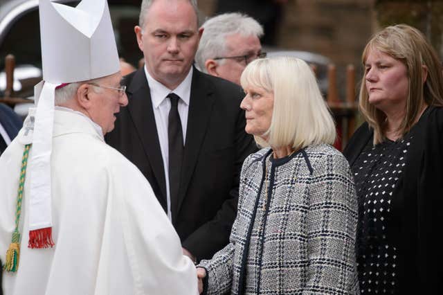 Archbishop Mario Conti speaks with Lord Martin's widow Mary (John Linton/PA)