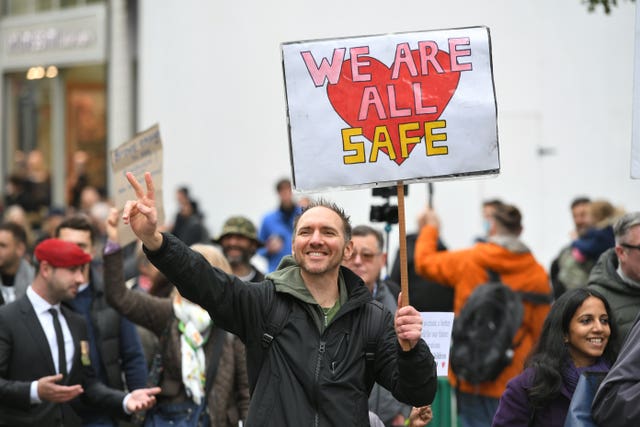 Protesters during an anti-lockdown rally (Dominic Lipinski/PA)
