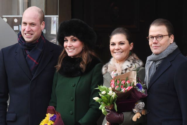 The Duke and Duchess of Cambridge, accompanied by Crown Princess Victoria and Prince Daniel of Sweden, walk from the Royal Palace of Stockholm to the Nobel Museum on the first day of their visit to Sweden. (Victoria Jones/PA)