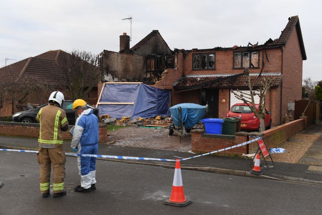 Police launch murder inquiry after three die in house fire