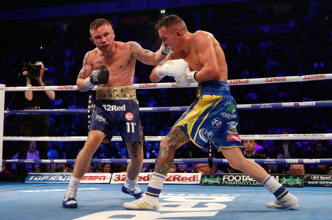Carl Frampton, left, lost to Josh Warrington last December (Martin Rickett/PA)