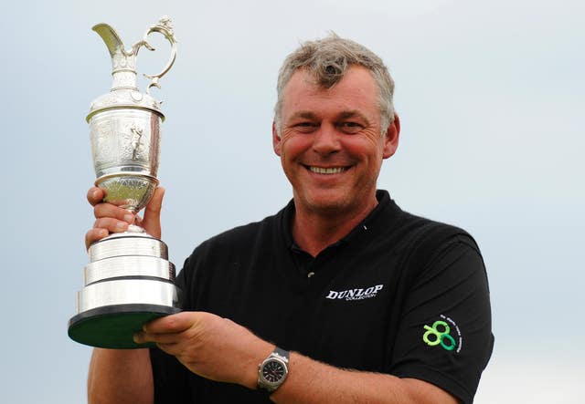 Darren Clarke holds the Claret Jug after winning the 2011 Open Championship at Royal St George’s