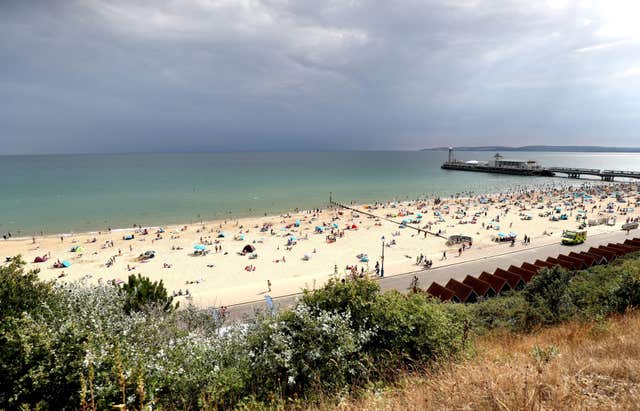 A third of Britons say they check the weather before they go out (Andrew Matthews/PA)