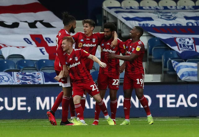 Cyrus Christie (second right) scored Fulham's winner at QPR (Jonathan Brady/PA).