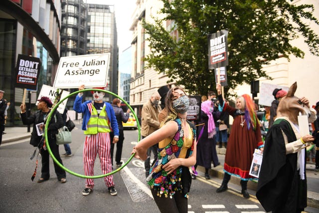 Protesters gather outside the Old Bailey