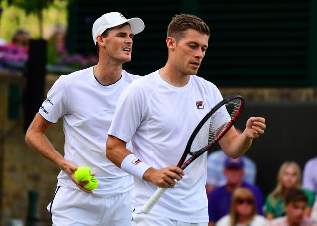 Jamie Murray and Neal Skupski (right) are in a tight race to qualify in doubles