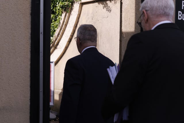 Sir Jeffrey Donaldson, left, arriving at Newry Crown Court