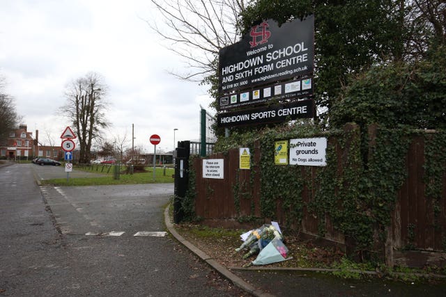 Floral tributes left outside Highdown School in Reading