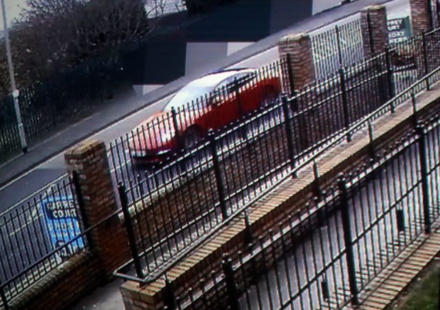CCTV of the red Porsche outside St Mary’s Grammar School