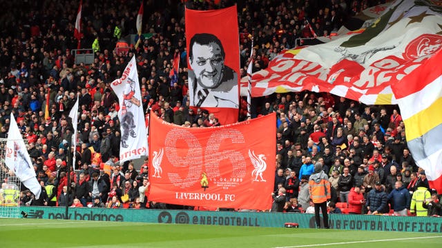 Fans commemorate the 30th anniversary of the Hillsborough disaster before a Premier League match at Anfield, Liverpoo