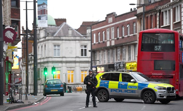 Police at the scene of Sunday's attack in Streatham High Road