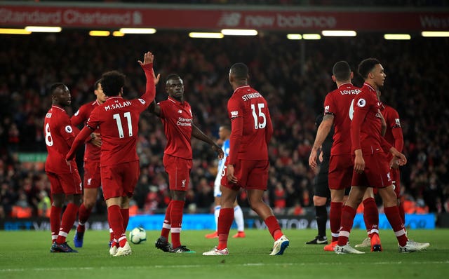 Liverpool’s victory over Huddersfield kept the pressure on City