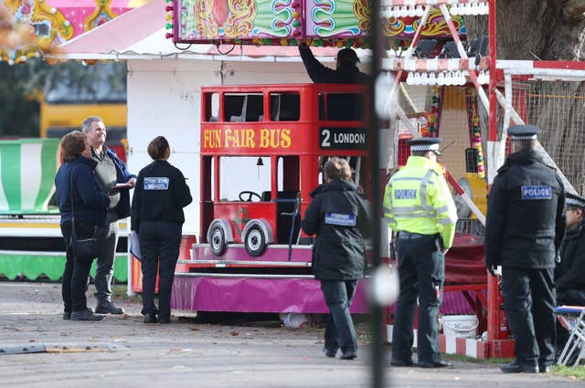 Crime scene investigators in Woking Park