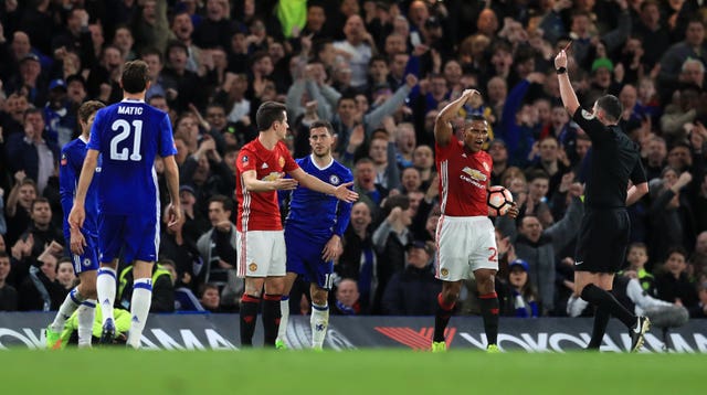 Manchester United midfielder Ander Herrera receives the red card