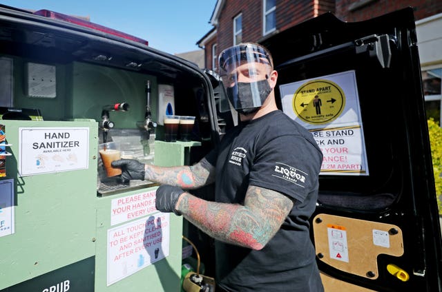 Harry McKeaveney pulls a pint in Belfast